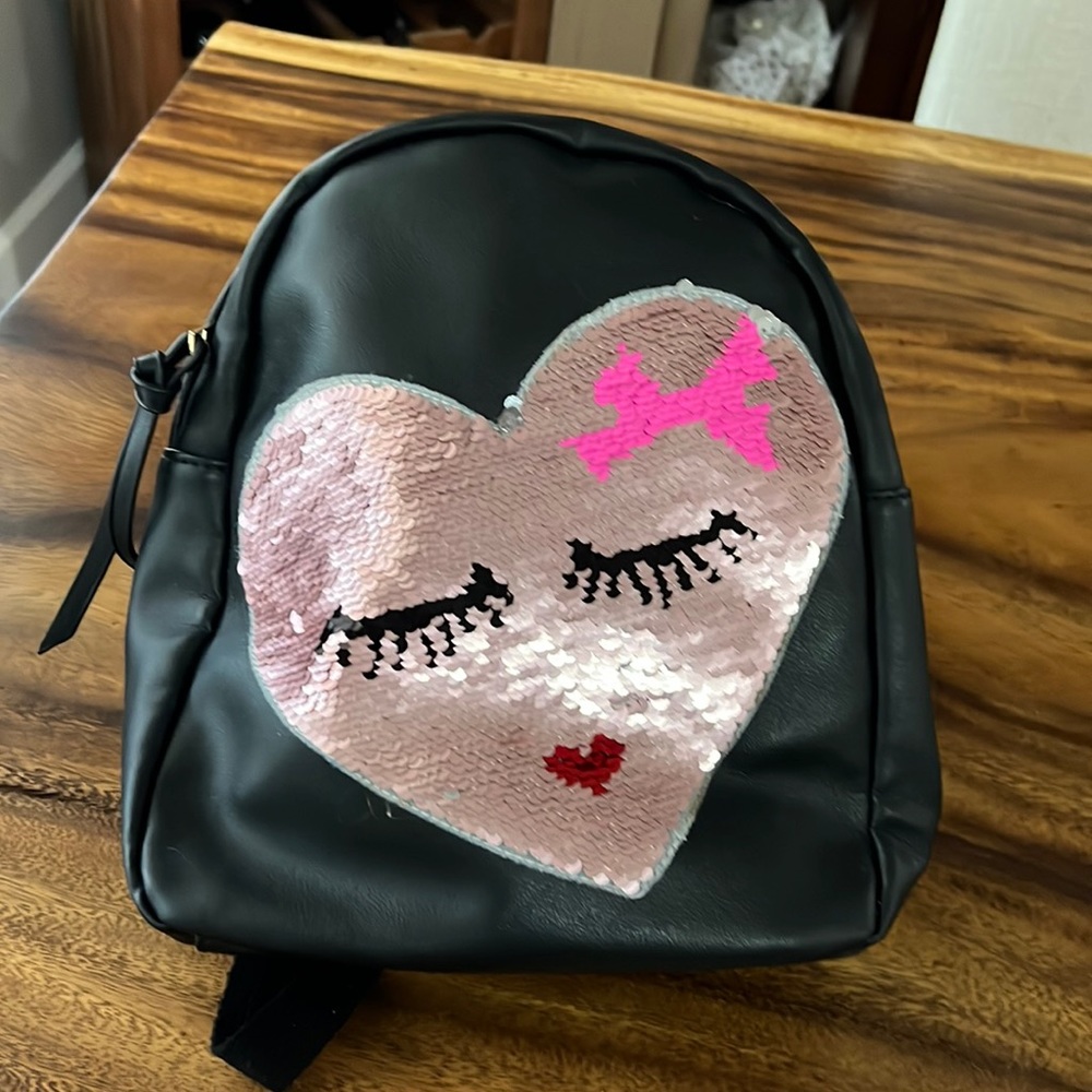 BLACK REVERSIBLE SEQUIN HEART KISSME COUTURE BACKPACK WITH ADJUSTABLE STRAPS